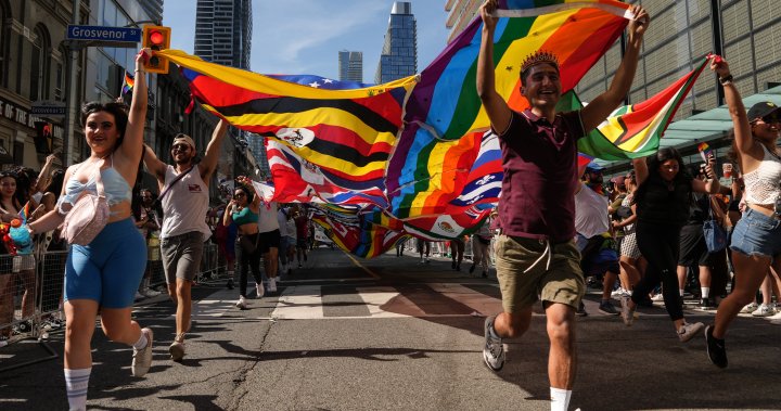 Downtown Toronto streets fill with revelers, rainbow flags for city’s Pride parade