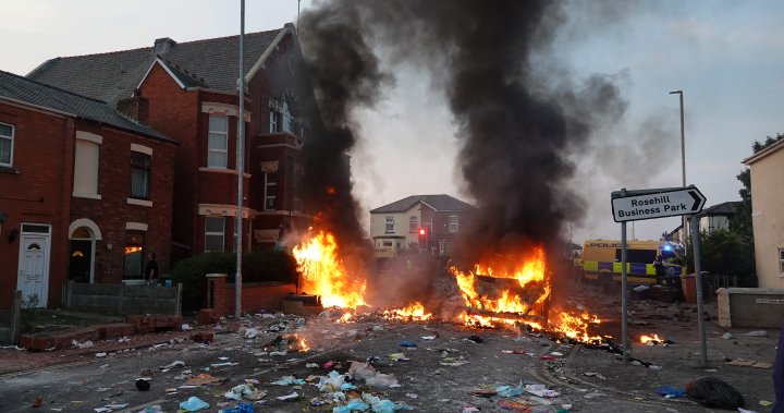 U.K. stabbings: Violent protesters attack police as town mourns 3 dead girls – National